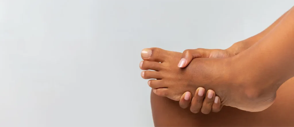 cropped of black girl rubbing her foot 2024 09 23 21 47 34 utc